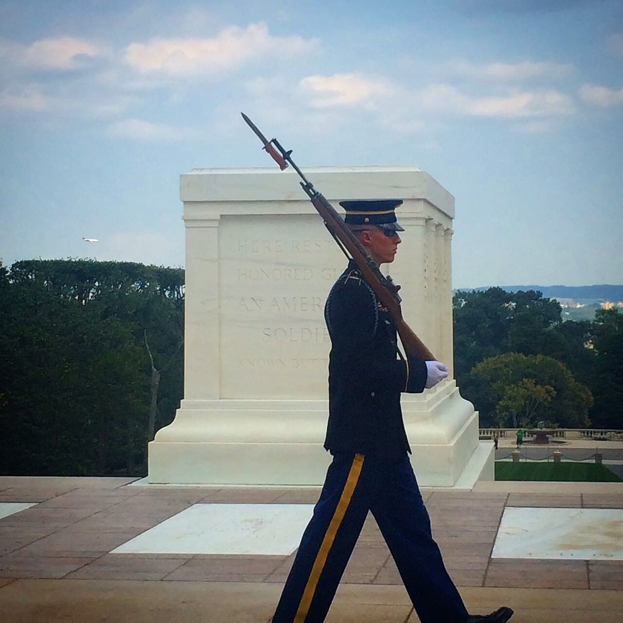 Sentinel walking guard at the Tomb of the Unknown Soldier